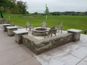 a patio with a fire pit and chairs - outdoor rooms - landscape design